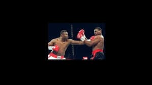 Oliver McCall vs. Larry Holmes — foto 1