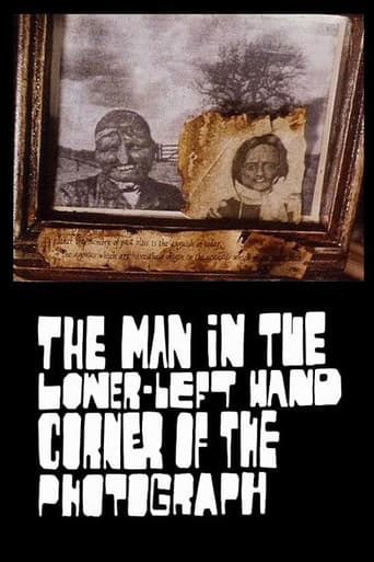 The Man in the Lower-Left Hand Corner of The Photograph
